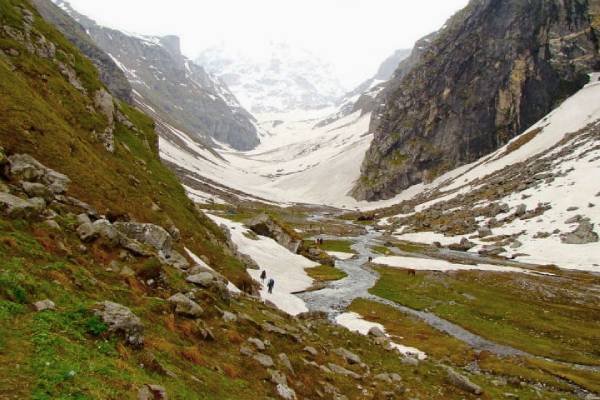Orchard-covered slopes and snow-capped backdrop of Pabbar Valley